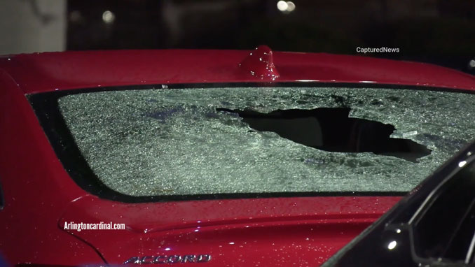 Rear window damage on a red Honda Accord at a Schaumburg auto dealership on Golf Road near Plum Grove Road (CapturedNews/Arlingtoncardinal.com)
