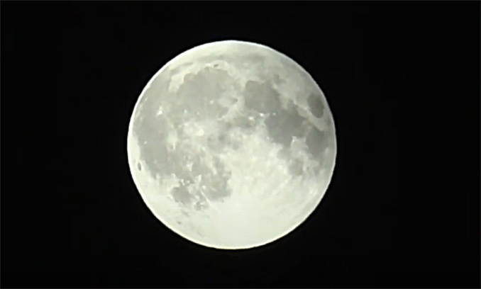 The appears as a Full Moon near the end of Total Lunar Eclipse at about 1:20 a.m. to 1:30 a.m.