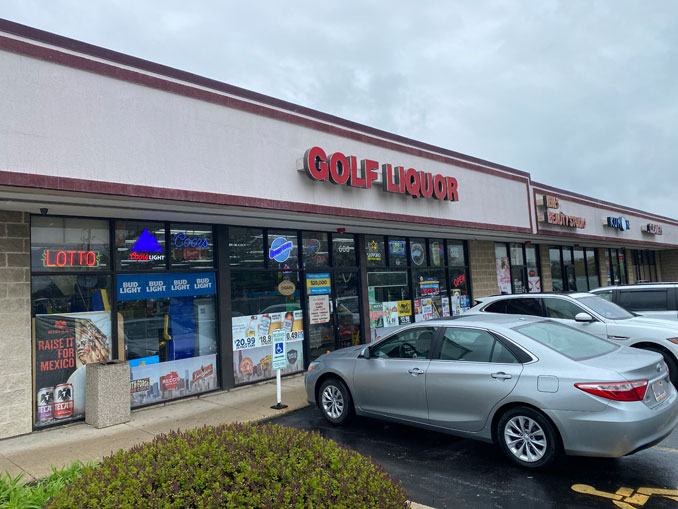 Golf Liquor store a few hours after a commercial burglary at the store with the glass door already repaired on Friday, May 6, 2022