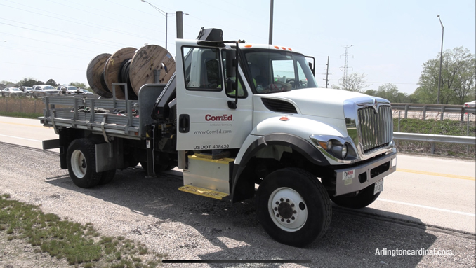 ComEd crews working on the Wilke Road frontage road on the east side of Route 53.