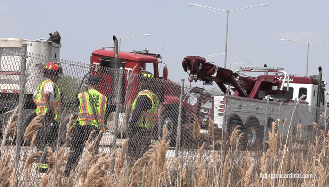 Firefighters located in the northbound lanes of Route 53 near the crashed dump truck.