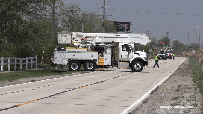 ComEd crews at work on the Wilke Road frontage road on the west side of Route 53.