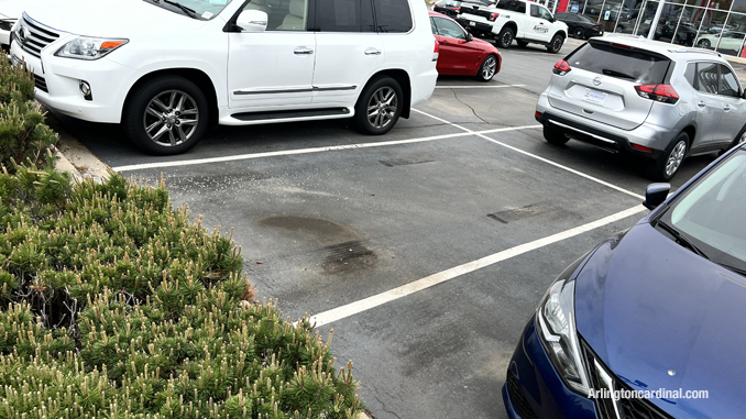 Empty parking space where a vehicle was stolen from Arlington Nissan, 1100 West Dundee Road in Arlington Heights