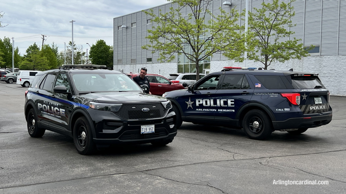 Police at the rear of Arlington Nissan after a black Chevrolet pickup truck and a gold Range Rover were stolen