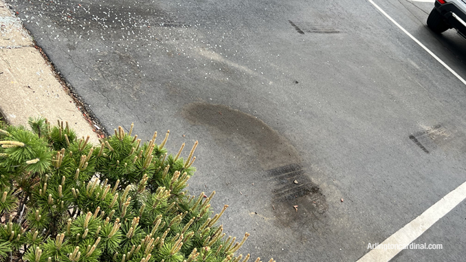 Stolen vehicle patch out with broken glass at the parking lot of Arlington Nissan