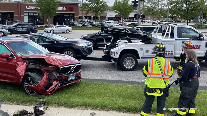 Crash scene with light pole down at Arlington Heights Road and Rand Road in Arlington Heights