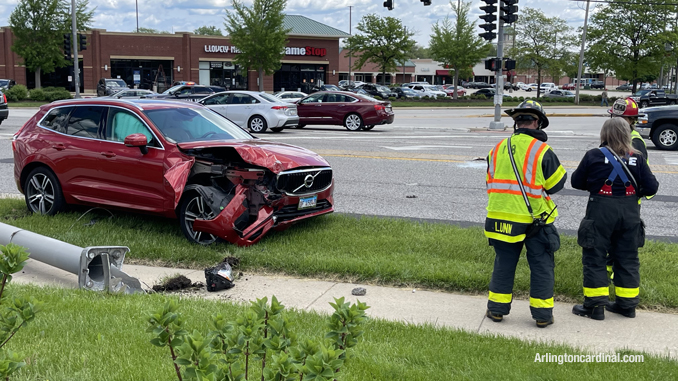 Crash scene with light pole down at Arlington Heights Road and Rand Road in Arlington Heights