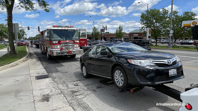 Crash scene with light pole down at Arlington Heights Road and Rand Road in Arlington Heights