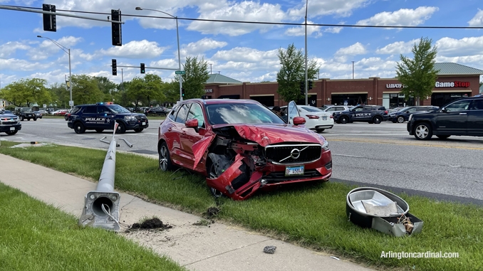 Crash scene with light pole down at Arlington Heights Road and Rand Road in Arlington Heights