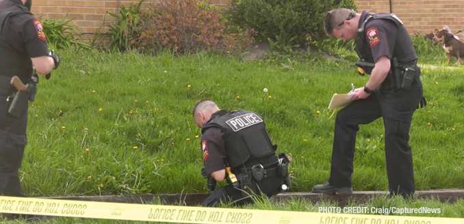 North Chicago Police Department investigating the scene  where two gunshot victims were located near Hervey Avenue and 15th Street in North Chicago (PHOTO CREDIT: Craig/CapturedNews)