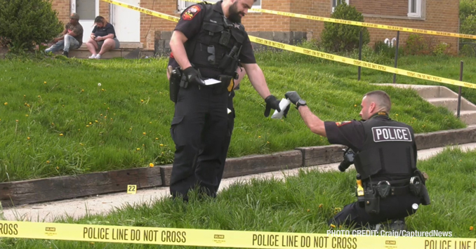 North Chicago Police Department investigating the scene  where two gunshot victims were located near Hervey Avenue and 15th Street in North Chicago (PHOTO CREDIT: Craig/CapturedNews)