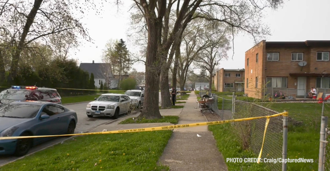 North Chicago Police Department investigating the scene  where two gunshot victims were located near Hervey Avenue and 15th Street in North Chicago (PHOTO CREDIT: Craig/CapturedNews)