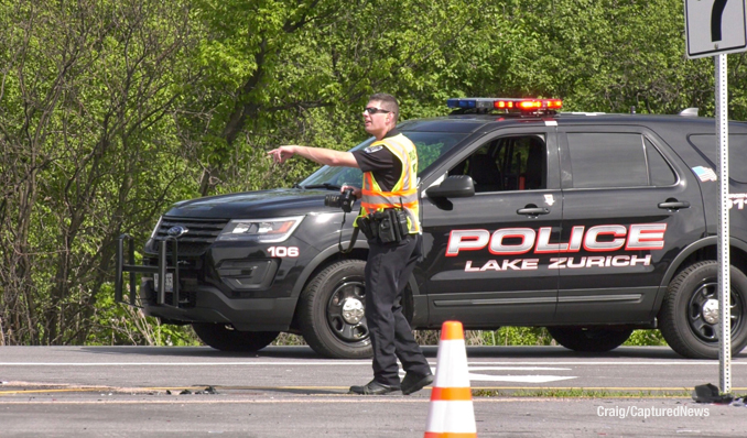 Crash scene at Rand Road and Clover Hill Lane in Lake Zurich (PHOTO CREDIT: Craig/Captured New)