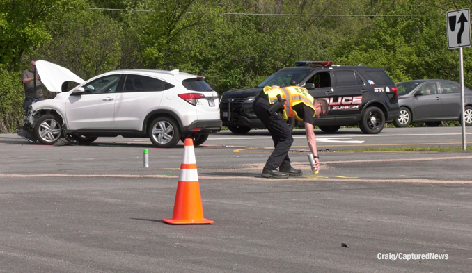 Crash scene at Rand Road and Clover Hill Lane in Lake Zurich (PHOTO CREDIT: Craig/Captured New)