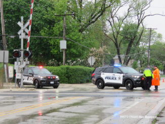 Police from Metra (left) and Morton Grove Police Department at the scene of a fatal pedestrian incident near the intersection of Lehigh Avenue and Beckwith Road in Morton Grove (PHOTO CREDIT: Max Weingardt)