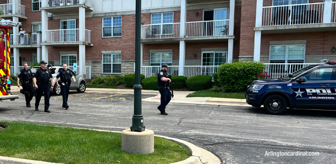 Police officers at the scene at the Fountains of Arlington Condominiums on Rand Road in Arlington Heights.
