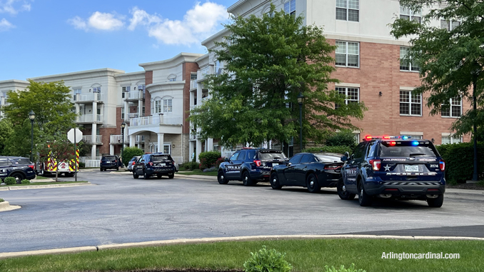 Police officers at the scene at the Fountains of Arlington Condominiums on Rand Road in Arlington Heights.