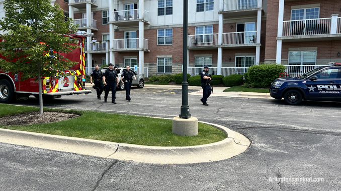 Police officers at the scene at the Fountains of Arlington Condominiums on Rand Road in Arlington Heights.