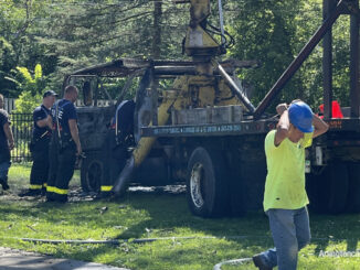 Tree trimming bucket truck destroyed after a fire involving the cab