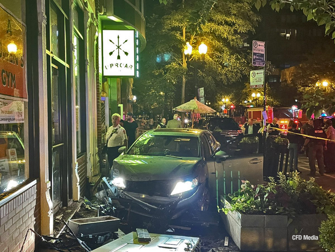 Lexus sedan in the patio dining area after a crash with another vehicle 1252 North Well Street in Chicago (SOURCE: CFD Media)