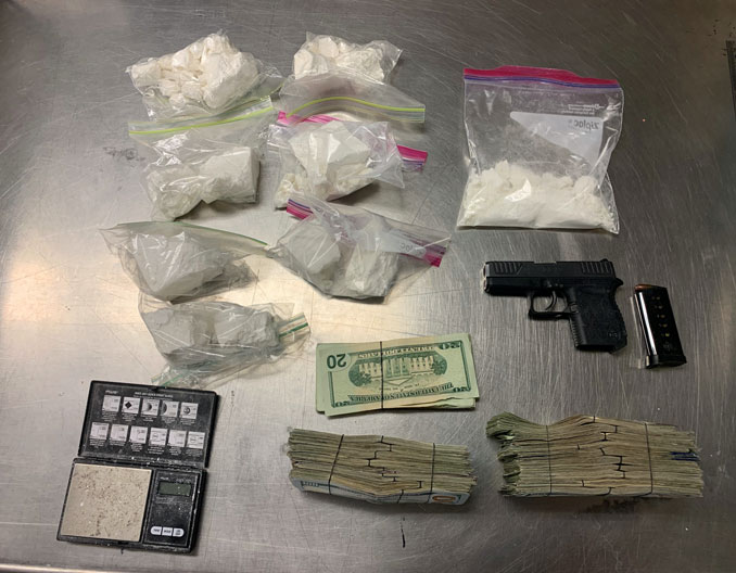 Drugs, a gun and money found at a business in Ingleside in Lake County (SOURCE: Lake County Sheriff's Office)