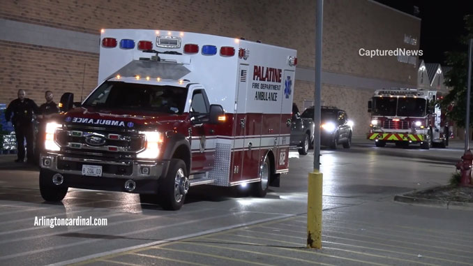 Ambulance and fire engine from Palatine Fire Department at Walmart just before a shooting victim was transported to the hospital