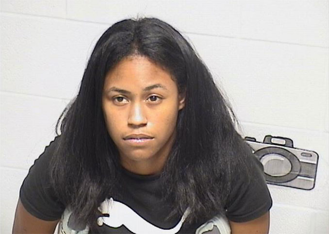 Dishelle Y. Flores, charged with Aggravated Unlawful Use of a Weapon (SOURCE: Lake County Sheriff's Office)