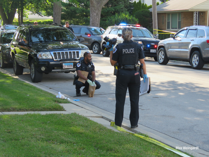 Skokie police at the scene of a shooting on Kirk Street in Skokie (PHOTO CREDIT: Max Weingardt)