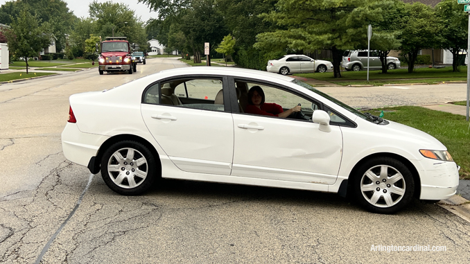 A female driver ignored traffic cones where Hintz Road was blocked and the rolled over pickup truck was obstructing lane just beyond the traffic cones.