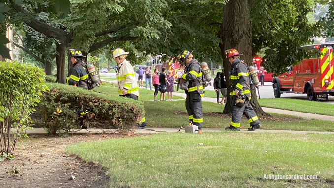 Firefighters entering the building on the west side at Cleveland Avenue in Arlington Heights