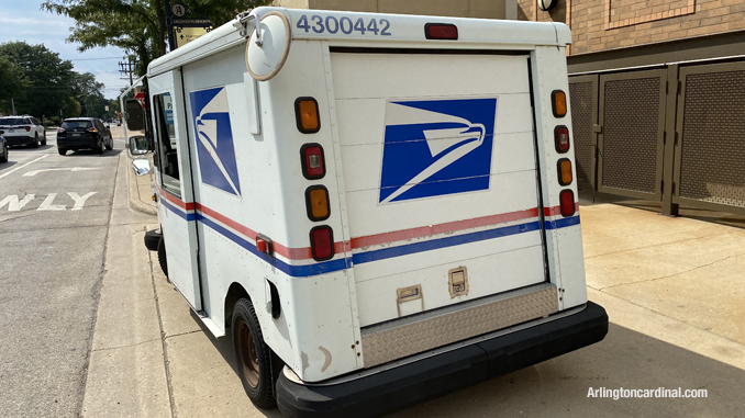 USPS delivery van that was sideswiped and was parked on the westbound side of Sigwalt Street near Arlington Heights Road in Arlington Heights after the crash