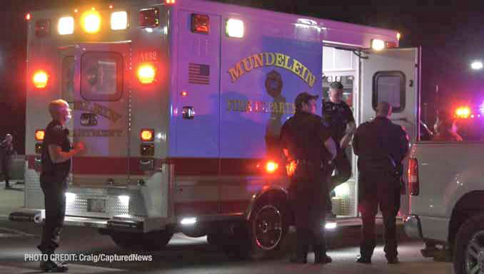 Mundelein firefighters and paramedics at scene on Lake Street in Mundelein (PHOTO CREDIT: Craig/CapturedNews)