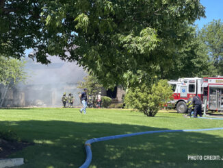 Smoke showing at the front of a house on McGlashen Drive in South Barrington (PHOTO CREDIT: Jimmy Bolf)