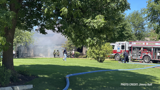 Smoke showing at the front of a house on McGlashen Drive in South Barrington (PHOTO CREDIT: Jimmy Bolf)