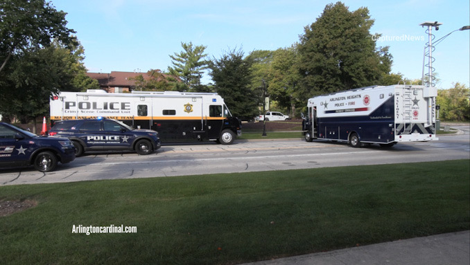 An Arlington Heights police/fire incident command van and the MCAT-STAR van at the scene of a serious crash at Lake Cook Road and Wilke Road in Arlington Heights