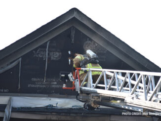 Ladder truck at the roof gable at attached garage fire on Hidden Creek Road in Lake Zurich, Wednesday, September 14, 2022 (PHOTO CREDIT: Max Weingardt)