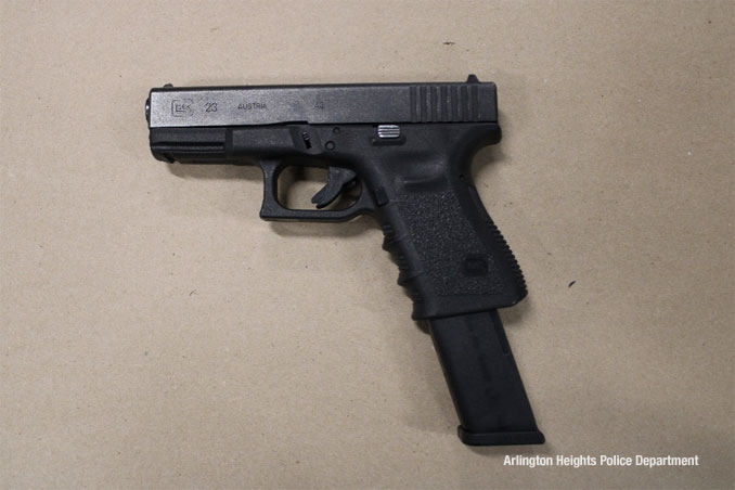 Glock model 23, .40 caliber with extended magazine found in rear seat (SOURCE: Arlington Heights Police Department)