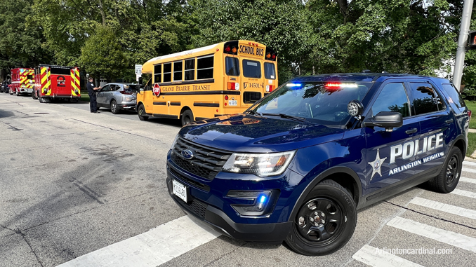 Minor sideswipe crash involving a yellow special needs bus and a silver sedan with vehicles stopped on Dunton Avenue just north of Euclid Avenue Arlington Heights.