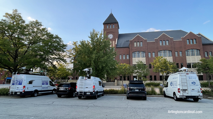 TV station remote trucks lined up at the Arlington Heights Village Hall during the Village Board meeting Tuesday, September 6, 2022 (CARDINAL NEWS)