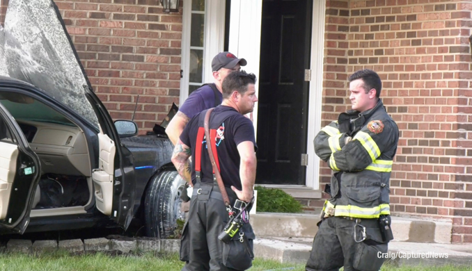 Crash scene involving a car against a house on Quigley Street in Mundelein on Thursday, September 8, 2022