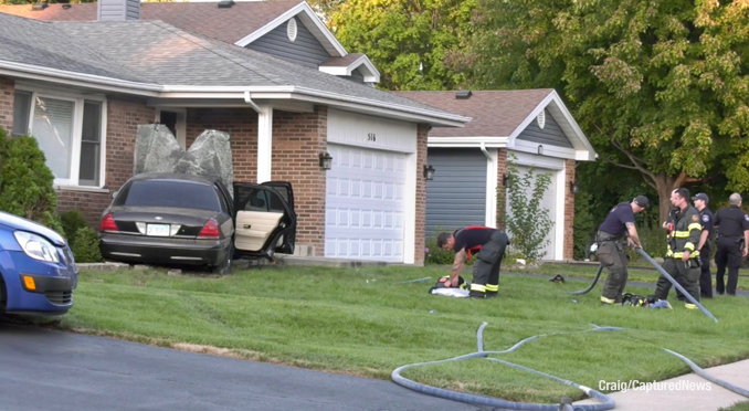 Crash scene involving a car against a house on Quigley Street in Mundelein on Thursday, September 8, 2022