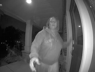 Woman just before she rings the RING doorbell just before 1:00 a.m. Tuesday, September 6, 2022