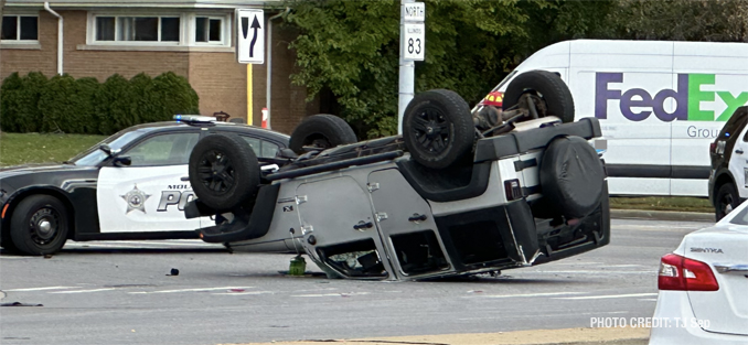 Elmhurst Road and Golf Road the scene of a flipped Jeep on Tuesday, October 18, 2022 (PHOTO CREDIT: TJ Sep)