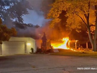 Flames from the front of a house "Side A" on Golf Road in Libertyville (PHOTO CREDIT: Mark Leonard)