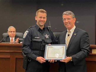 Police Officer Treston Schoeny (left) with Arlington Heights Mayor Tom Hayes (PHOTO CREDIT: Village of Arlington Heights)