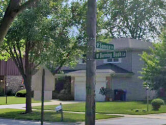 Seneca Lane and Burning Bush Lane Street Sign northeast of Frost Elementary School in Mount Prospect (Image Capture August 2019 ©2022 Google)