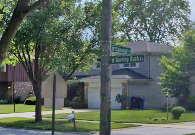 Seneca Lane and Burning Bush Lane Street Sign northeast of Frost Elementary School in Mount Prospect (Image Capture August 2019 ©2022 Google)