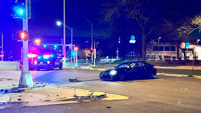 Wrecked black Lexus in the westbound lanes of Palatine Road just west of Rand Road in Arlington Heights