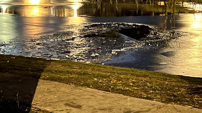 A hole in the ice were four young boys fell through into water at an apartment pond on Panorama Drive in Palatine