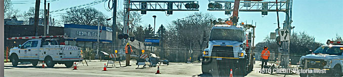 Repairs ongoing just before noon on Friday, November 25, 2022 after a truck driver crashed into a railroad crossing signal at Northwest Highway and Wilke Road in Arlington Heights (PHOTO CREDIT: Victoria West)